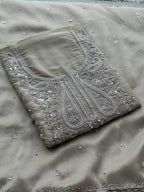 Soft Beige Designer Suit with Elegant Threadwork & Embellished Neckline