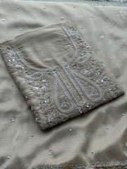 Soft Beige Designer Suit with Elegant Threadwork & Embellished Neckline