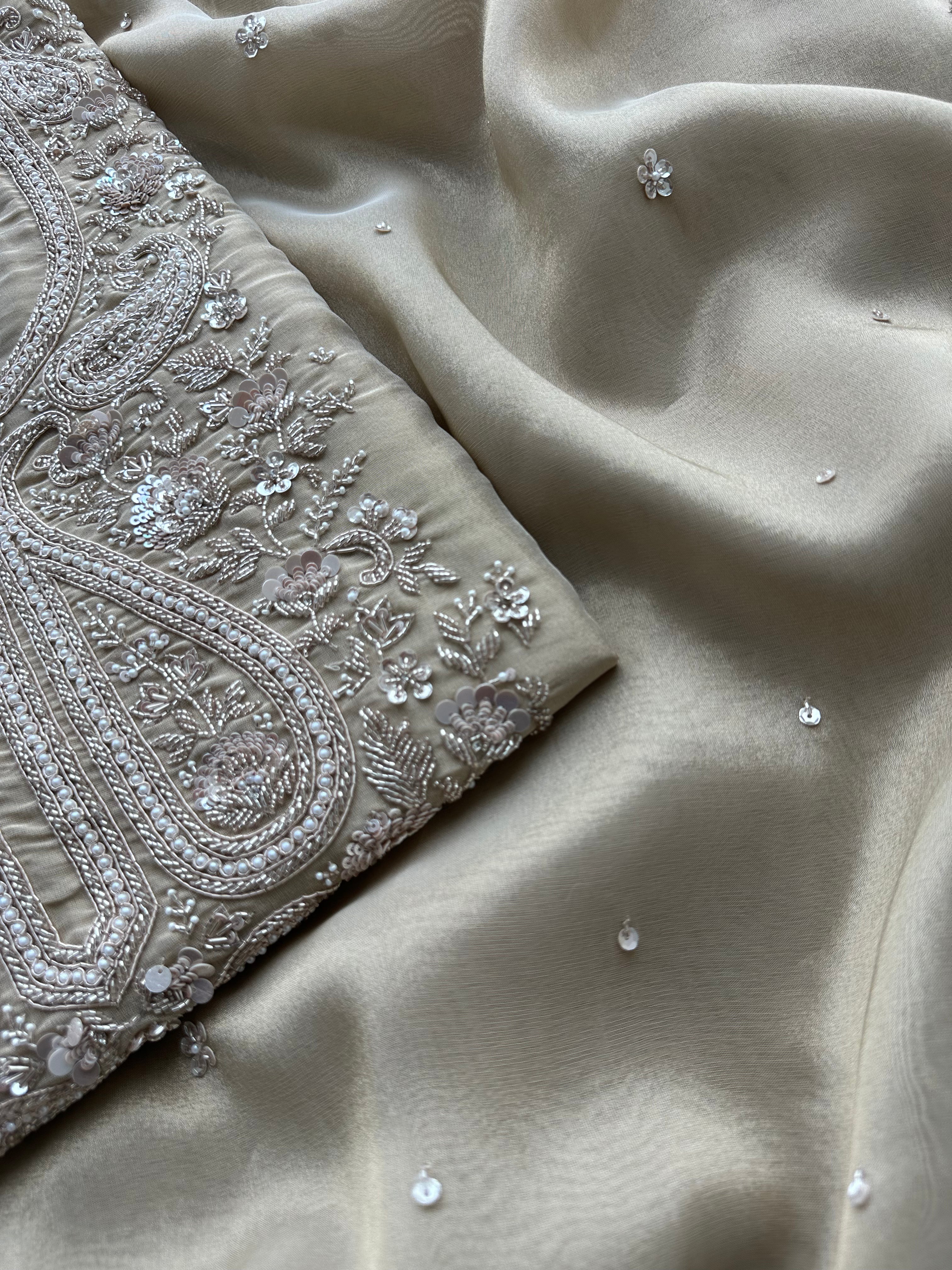 Soft Beige Designer Suit with Elegant Threadwork & Embellished Neckline