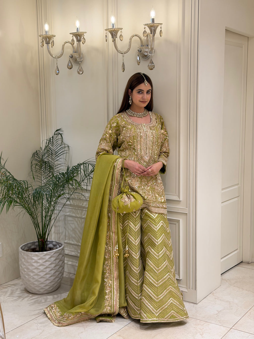 Zari & Pearl Hand Embroidered Festive Suit with Intricate Neckline Detailing