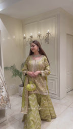 Zari & Pearl Hand Embroidered Festive Suit with Intricate Neckline Detailing